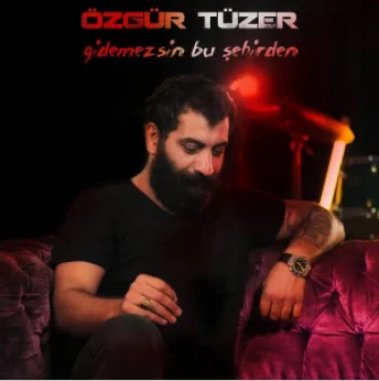 Özgür Tüzer - Gurbette Ömrüm Geçecek